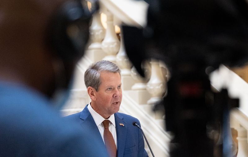 Gov. Brian Kemp gives an update about COVID-19 in Georgia at the State Capitol on Thursday morning.  Ben Gray for The Atlanta Journal-Constitution