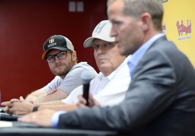DARLINGTON, SC - SEPTEMBER 04:  Dale Earnhardt Jr. listens as Dr. Micky Collins of the University of Pittsburgh Medical Center Sports Medicine Concussion Program, speaks during a press conference prior to the NASCAR Sprint Cup Series Bojangles' Southern 500 at Darlington Raceway on September 4, 2016 in Darlington, South Carolina.  (Photo by Blaine Ohigashi/Getty Images)