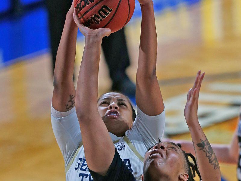 Georgia Tech guard Anaya Boyd (top) blocks a shot by Stephen F. Austin forward Avery Brittingham (11) during the second half of their first round women's NCAA Tournament game Sunday, March 21, 2021, at the Greehey Arena in San Antonio, Texas. (Ronald Cortes/AP)