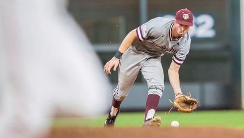 Texas A&M Aggies shortstop Braden Shewmake (8) fields a ground ball in the 2019 Shriners Hospitals for Children College Classic baseball game between the Texas A&M Aggies and the Houston Cougars March 3, 2019, at Minute Maid Park in Houston.