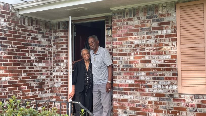 Dorothy and Oscar Wilson at the door of their Morrow home. The bank foreclosed on them for being $1,062.45 behind.