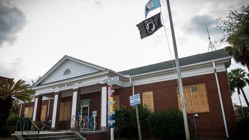 Tybee Island City Hall is boarded up in preparation for Hurricane Matthew, Tuesday, Oct. 4, 2016 in Tybee Island, Ga. (Josh Galemore/Savannah Morning News via AP)