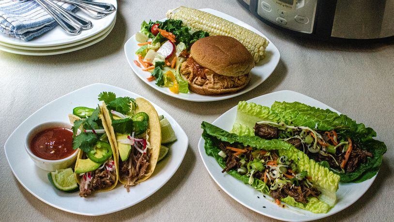Put your slow cooker to use for a trio of summer-friendly meals: (clockwise, from top center) Pulled Sweet Heat Barbecue Chicken, Korean-Style Beef Lettuce Wraps and Carnitas-Style Slow Cooker Pork Tacos. (Virginia Willis for The Atlanta Journal-Constitution)