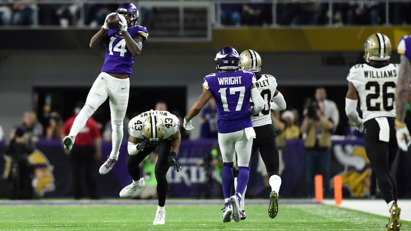 Minnesota's Stefon Diggs leaps to catch the ball in the fourth quarter of the NFC Divisional Playoff game against the New Orleans Saints Jan. 14, 2018, at U.S. Bank Stadium in Minneapolis. Diggs scored a 61-yard touchdown to win the game 29-24
