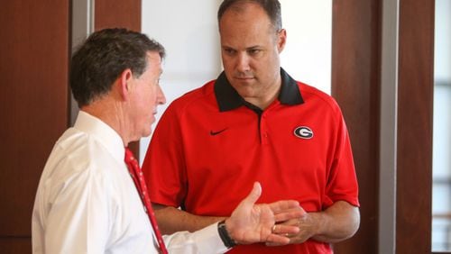 Mark Fox (right) led Georgia to a 19-15 season, which ended with a first-round loss in the NIT. (Photo by Randy Schafer)