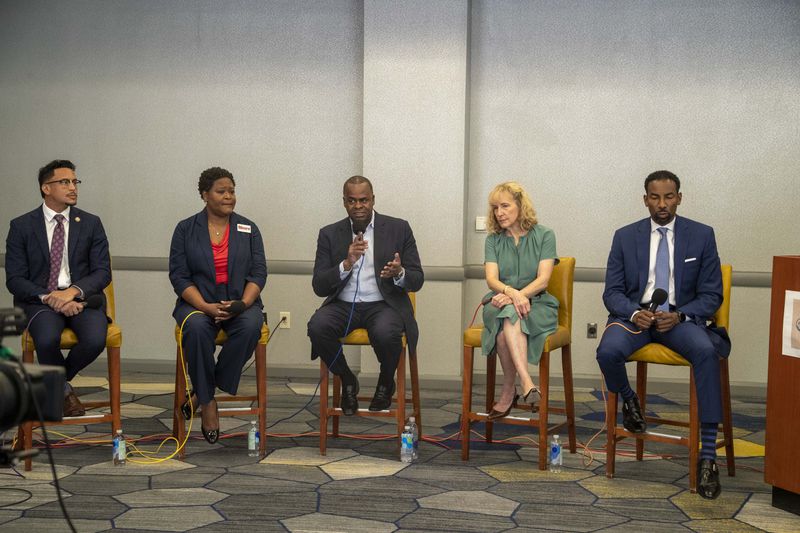 Atlanta mayoral candidates Antonio Brown (from left), Felicia Moore, Kasim Reed, Sharon Gay and Andre Dickens, participate in a  forum hosted by the Partners for HOME and Policing Alternatives & Diversion Initiative at the Institute of Technology Hotel and Conference Center in Atlanta on October 1, 2021.  (Alyssa Pointer/Atlanta Journal-Constitution)