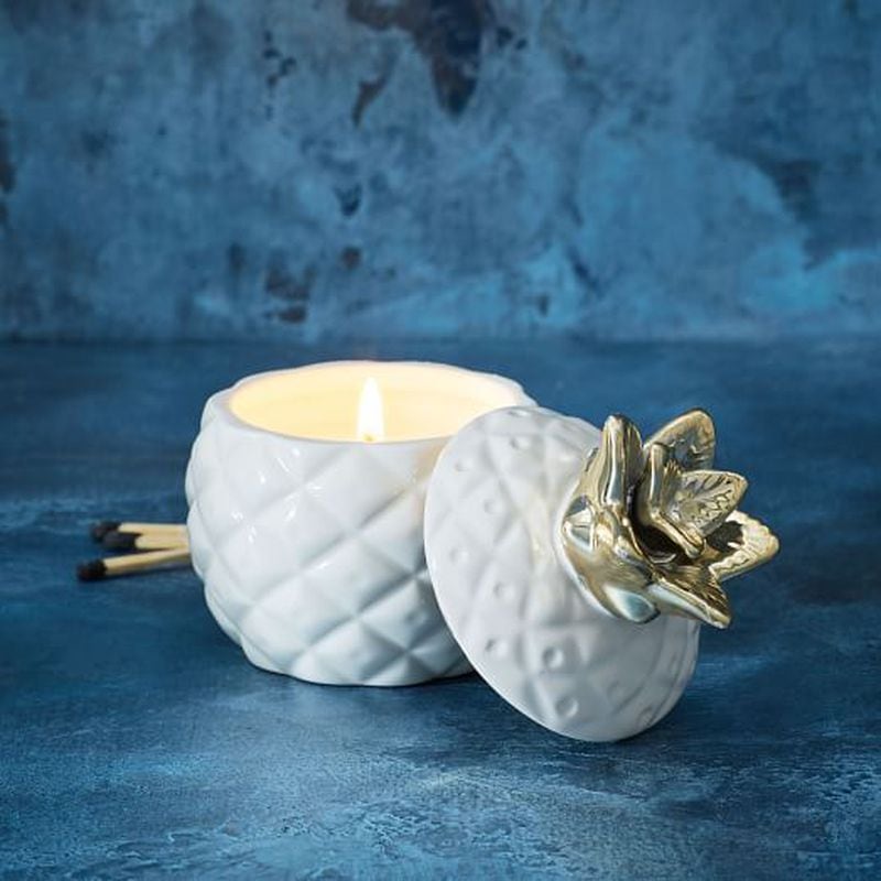 Give the gift of scent by dropping one of these Mini Pineapple Figurative Scented Candles in your loved ones' stockings. Despite the pineapple design, the scent is fruit julep. Makes a nice container for jewelry or other small objects when the candle's done. $11 at West Elm.