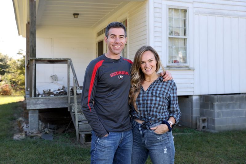 Jared and Brandy Kirschner are in the beginning phases of renovating the Hembree farmhouse in Roswell. (Jason Getz / Jason.Getz@ajc.com)