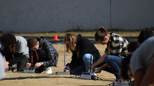 Engineering-focused students at Innovation Academy prepare to launch their rockets. (Courtesy Innovation Academy students Brooke Kluchar and Sarah Small)
