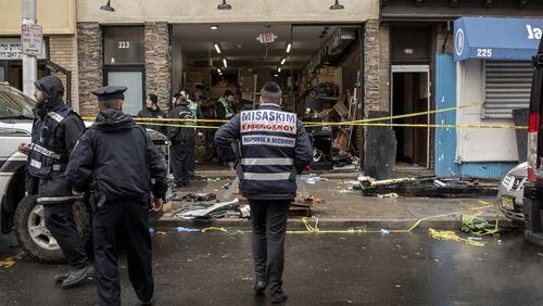 A gunfight at a kosher market on Dec. 10 left several people dead in Jersey City, N.J. Among those killed were the two armed suspects who stormed the market; they had expressed interest in the Black Hebrew Israelites, a fringe religious group whose members often rail against Jews and whites. BRYAN ANSELM / THE NEW YORK TIMES