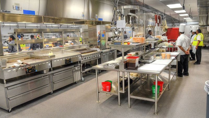 A large full-service commercial kitchen gears up for the needs of the many during game days and events at the new Mercedes-Benz Stadium. CHRIS HUNT / SPECIAL