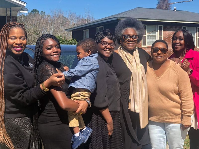 After the funeral of 64-year-old Andrew J. Mitchell on Feb. 29, dozens of family members later fell ill. One of his nieces, Tonya Thomas, 51, died of COVID-19 on Friday at Piedmont Fayette Hospital. She’s pictured here at a post-funeral gathering on Feb. 29. Left to right are Abrigail Johnson, Margaret Mansfield, Brenden Mansfield (baby), Jacqueline Mansfield, Dorothy Johnson, Tonya Thomas and Nakimbra Savage. SPECIAL