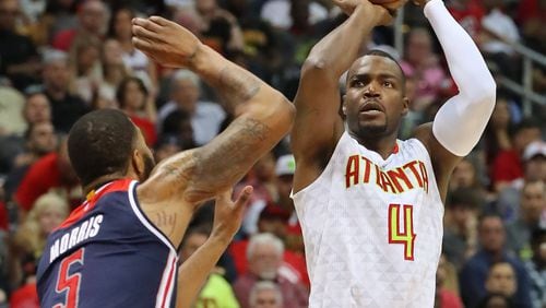 Atlanta Hawks Paul Millsap shoots for two over Washington Wizards Markieff Morris in Game 3 of a first-round NBA basketball playoff series on Saturday, April 22, 2017, in Atlanta. Curtis Compton/ccompton@ajc.com