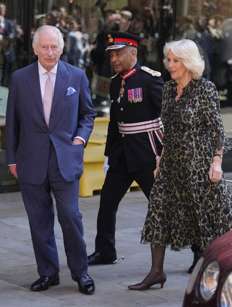 Britain's King Charles III and Queen Camilla arrive for a visit to University College Hospital Macmillan Cancer Centre in London, Tuesday, April 30, 2024. The King, Patron of Cancer Research UK and Macmillan Cancer Support, and Queen Camilla visited the University College Hospital Macmillan Cancer Centre, meeting patients and staff. This visit is to raise awareness of the importance of early diagnosis and will highlight some of the innovative research, supported by Cancer Research UK, which is taking place at the hospital. (AP Photo/Kin Cheung)