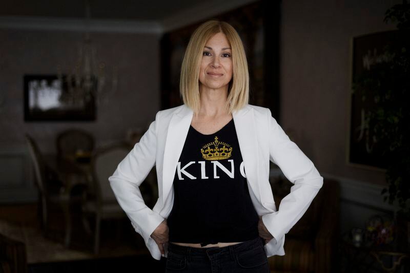 Suzanne Harrison, who runs King's Crusade in honor of her brother who died of an overdose in 2016 poses for a photograph in Evesham, N.J., Tuesday, April 2, 2024. Harrison says the charity could use funding from national opioid settlements to help people if local governments made it available to groups like hers. (AP Photo/Matt Rourke)