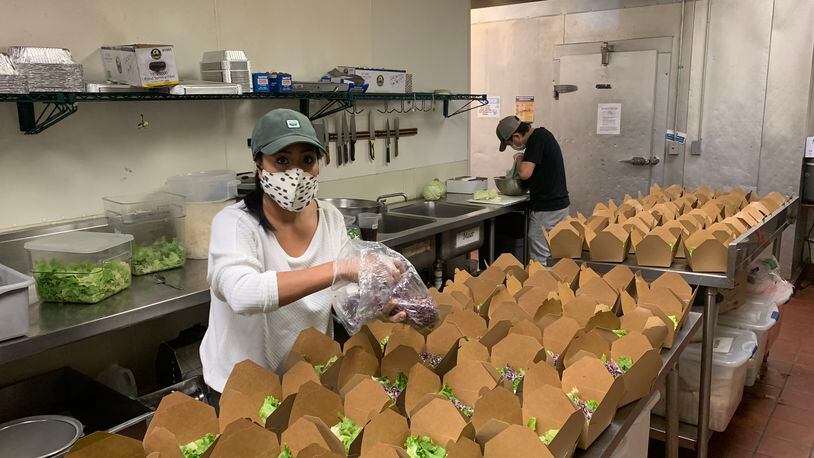 The kitchen at Tuk Tuk Thai Food Loft preparing orders for Feed the Frontline. COURTESY OF TAMARIND RESTAURANT GROUP