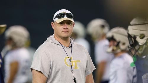 Georgia Tech coach Brent Key watches warmups during their first day of spring football practice at the Brock Indoor Practice Facility, Monday, March 11, 2024, in Atlanta. (Jason Getz / jason.getz@ajc.com)