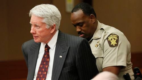 4/23/18 - Atlanta - After the verdict, Tex McIver is handcuffed and taken into custody.  The jury found Tex McIver guilty on four of five charges on April 23,  their fifth day of deliberations at the Fulton County Courthouse.   Bob Andres bandres@ajc.com