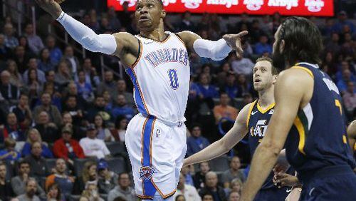 Thunder star Russell Westrbook is averaging 23.3 points, 9.7 assists and 9.5 rebounds per game. (AP Photo)