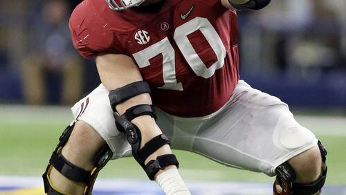 FILE - In this Dec. 31, 2015, file photo, Alabama center Ryan Kelly (70) sets up for a play against Michigan State during the first half of the Cotton Bowl NCAA college football semifinal playoff game in Arlington, Texas. Kelly is one of the top offensive players available in the NFL Draft, which starts April 28 in Chicago. (AP Photo/LM Otero, File)