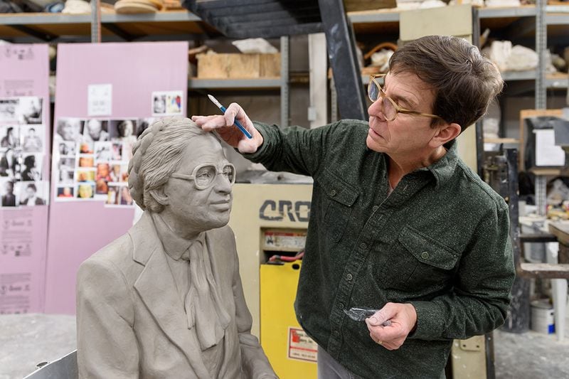 Martin Dawe and the workers at Cherylion Studio working on the Rosa Parks installation