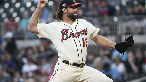 R.A. Dickey of the Braves pitches against the New York Mets at SunTrust Park. (Photo by John Amis/Getty Images)