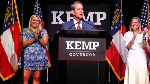 Governor Brian Kemp delivers his election night party speech backed by his wife and children (from left) Lucy, Jarrett, First Lady Marty Kemp, and Amy at the College Football Hall of Fame on Tuesday, May 24, 2022, in Atlanta. Curtis Compton / Curtis.Compton@ajc.com