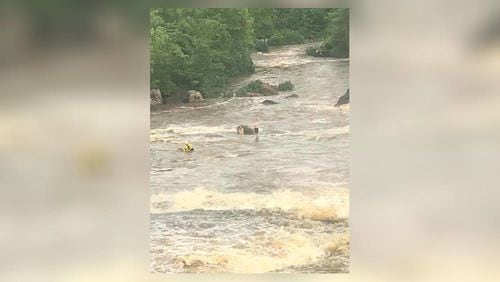Two 17-year-old swimmers were rescued from the Towaliga River at High Falls State Park Tuesday night after they became stranded.