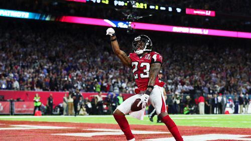 HOUSTON, TX - FEBRUARY 05:  Robert Alford #23 of the Atlanta Falcons celebrates after scoring a touchdown on a 82 yard interception against the New England Patriots in the second quarter during Super Bowl 51 at NRG Stadium on February 5, 2017 in Houston, Texas.  (Photo by Tom Pennington/Getty Images)