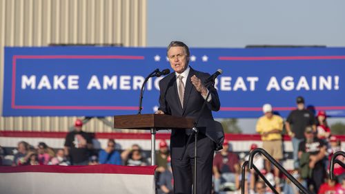 Republican U.S. Sen. David Perdue speaks at a rally for President Donald Trump in October at Middle Georgia Regional Airport in Macon. Georgia is a competitive state during the current election cycle and has drawn lots of campaign spending from groups outside the state. (Alyssa Pointer / Alyssa.Pointer@ajc.com)