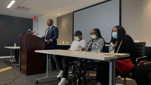 Attorney Shean Williams and D’Mari Johnson's family addressed the media Monday morning, more than a week after the 11-year-old was shot in the back of the head outside a skating rink in DeKalb County. (Credit: Caroline Silva / Caroline.Silva@ajc.com)