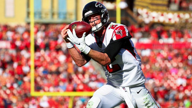 Quarterback Matt Ryan of the Atlanta Falcons hauls in the touchdown pass from wide receiver Mohamed Sanu in the third quarter of the game Dec. 30, 2018, at Raymond James Stadium in Tampa, Fla.