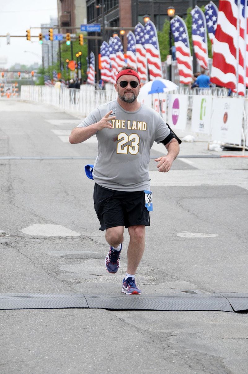 Atlanta restaurateur Shaun Doty took up marathon running in 2016. “My goal is to be able to complete the marathon before the street sweeper comes by me,” said Doty. “As long as I don’t get kicked off the course, I consider it a win.” CONTRIBUTED