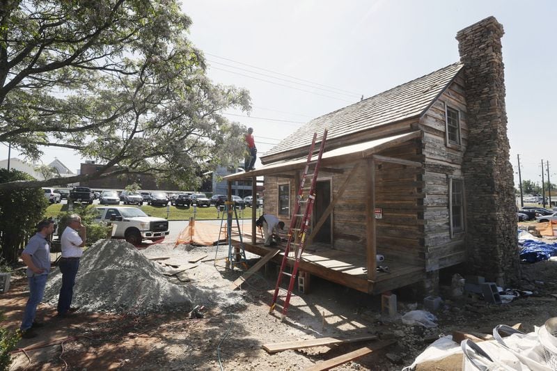 May 2, 2019 - Marietta - A pioneer cabin is being restored on the site of the Root House in Marietta. Cobb Landmarks is renovating its William Root House Museum, an old house in downtown Marietta that showcases the lives of people in antebellum Georgia. They have began reconstructing the smokehouse and a log cabin on to the site. Bob Andres / bandres@ajc.com