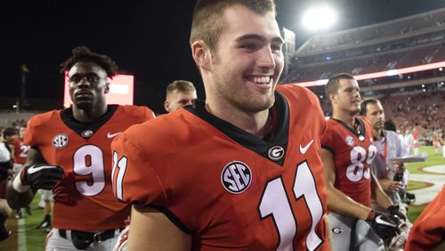 Georgia quarterback Jake Fromm walks off the field after a Bulldogs victory against Appalachian State, Saturday, Sept. 2, 2017, in Athens.  (AP Photo/John Amis)