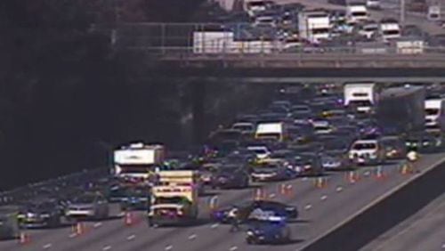 Authorities are investigating a deadly crash that shut down I-285 East in Sandy Springs.