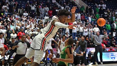 March 11, 2022 Macon - Grovetown's Frankquon Sherman (2) dunks the ball at the end of the 4th quarter during the 2022 GHSA State Basketball Class AAAAAA Boys Championship game at the Macon Centreplex in Macon on Friday, March 11, 2022. Grovetown won 66-59 over Buford.  (Hyosub Shin / Hyosub.Shin@ajc.com)