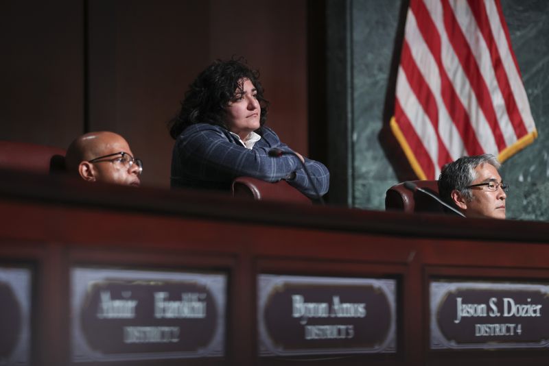 Council member Liliana Bakhtiari stands as she listens with fellow council members during the public speaking portion ahead of the final vote to approve legislation to fund the training center on Monday, June 5, 2023, in Atlanta. (Jason Getz / Jason.Getz@ajc.com)