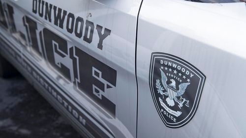 Dunwoody police cars parked outside of the city of Dunwoody municipal building.  (Alyssa Pointer/alyssa.pointer@ajc.com)