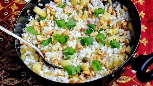 Sabudana khichdi is made with tapioca pearls, cubed potatoes, peanuts, green chilies and lime juice, garnished with cilantro. (Lake Fong/Pittsburgh Post-Gazette/TNS)