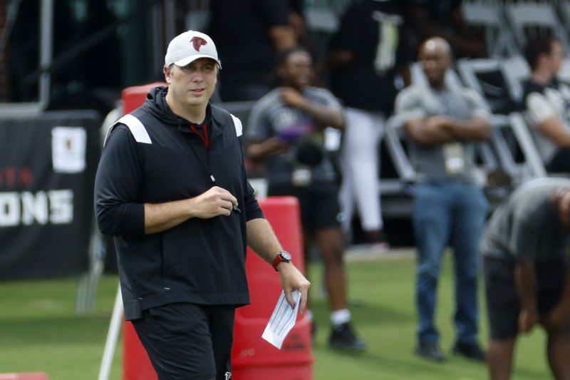 Falcons head coach Arthur Smith looks over the field during a joint training camp with the Jacksonville Jaguars at the Falcons Practice Facility on Wednesday, August 24, 2022, in Flowery Branch, Ga. Miguel Martinez / miguel.martinezjimenez@ajc.com
