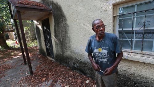 September 26, 2019 Atlanta: Life-long resident Perry Holloway, 66, stands beside a home he owns on South Avenue showing the mold growth that has made it unlivable as a result of flooding in the area. Curtis Compton/ccompton@ajc.com