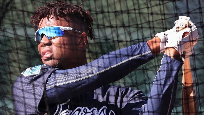 Ronald Acuna has been arguably the best player in the Grapefruit League this spring. He was reassigned to minor league camp by the Braves on Monday. (Curtis Compton/ccompton@ajc.com)