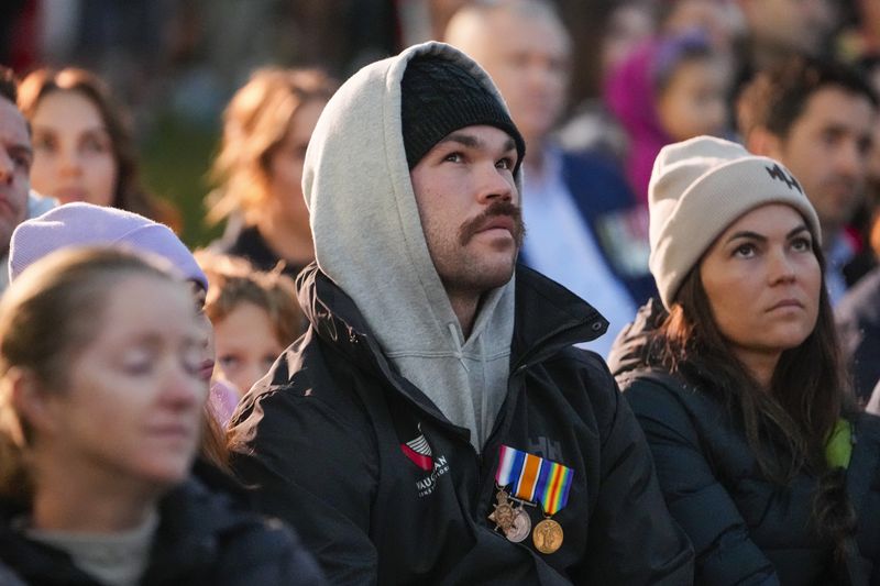 A veteran reacts during an Anzac Day dawn service at Coogee Beach in Sydney, Australia, Thursday, April 25, 2024. (AP Photo/Mark Baker)