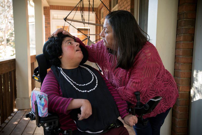Shelly Dollar (right), pictured with her daughter Gabby, says proposed waiver changes would take away Gabby's ability to live independently. (Courtesy of Robin Rayne/ZUMA)