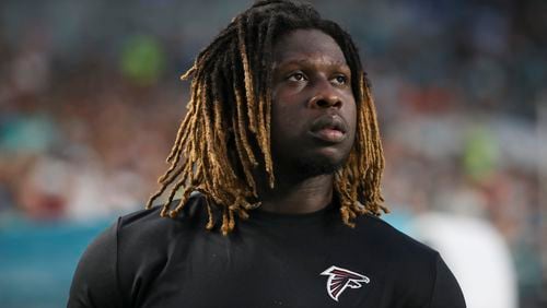 Atlanta Falcons defensive end Takkarist McKinley (98) looks on from the bench during exhibition against the Miami Dolphins Thursday, Aug. 10, 2017 in Miami Gardens, Fla.