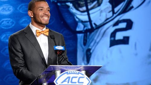 Georgia Tech’s Ricky Jeune reacts to reporters’ compliments on his bow tie during the 2017 ACC Football Kickoff media event in Charlotte, N.C., Friday July 14, 2017. (Photo by Sara D. Davis, the ACC.com)