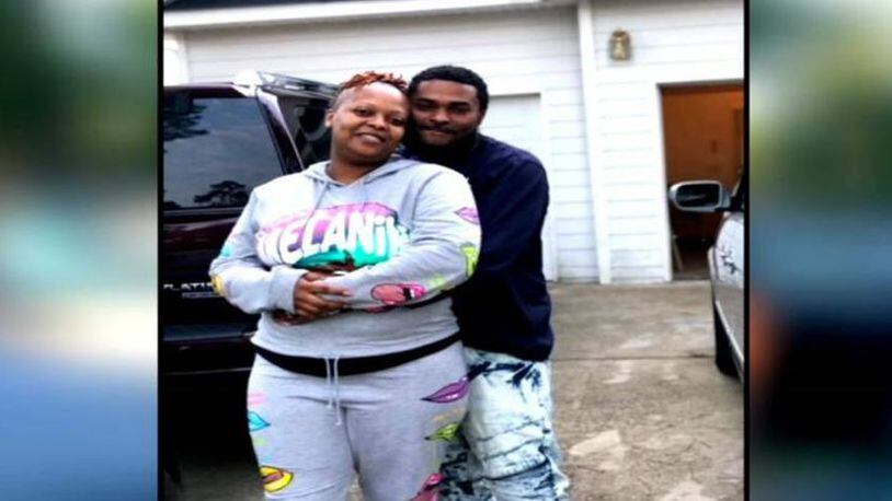 Reginald McDonald (right) and his wife Arista Pittman. McDonald was killed Nov. 9 while helping someone change a tire at a DeKalb County apartment complex.