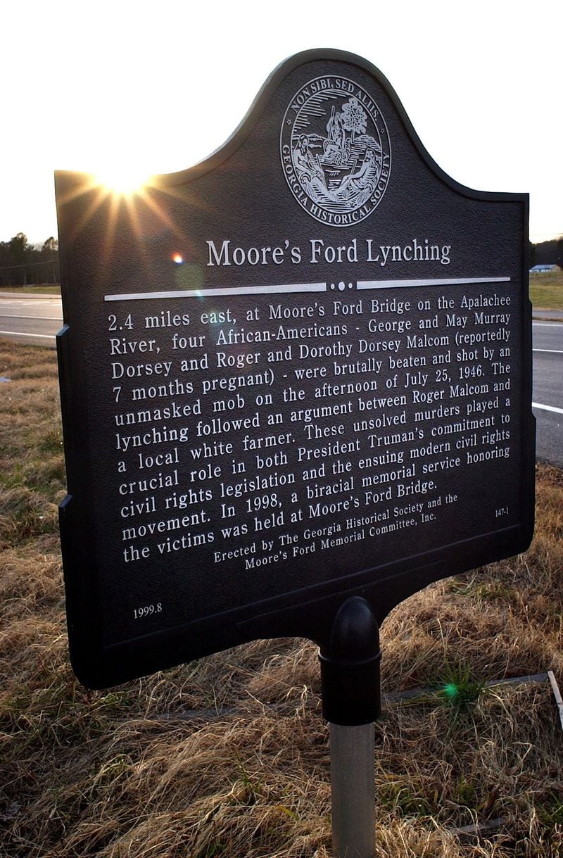 A road marker along Hwy. 78 in Walton County memorializes the murders at Moore’s Ford near Monroe. The area is the site of a 1946 lynching of two black couples. (JOHN AMIS / SPECIAL)