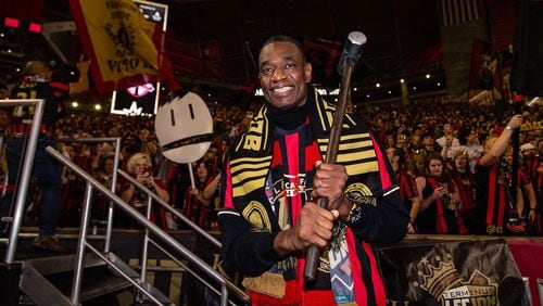 Former Hawks player Dikembe Mutombo performs the Golden Spike tradition at the Atlanta United game.
Contributed by Atlanta United